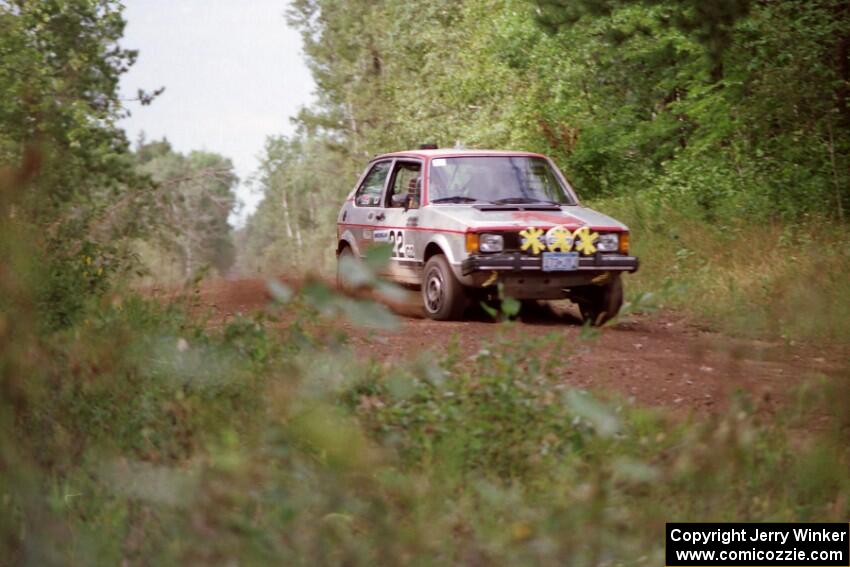 The Lynn Anderson / Barry Berg VW GTI comes over a crest on Indian Creek Trail Rd.