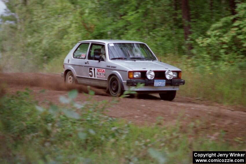 Bob Nielsen / Diane Sargent at speed in their VW GTI on Indian Creek Trail Rd. on day two.