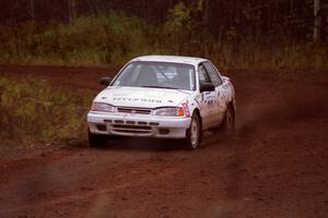 Tom Ottey / Pam McGarvey do a shakedown run on the press stage in their Rod Millen built Hyundai Elantra.