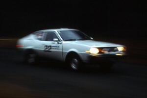 Chris Czyzio / Eric Carlson take their Plymouth Arrow down a fast forest road in the Huron Mountains.