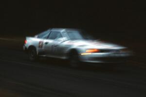 Janice Damitio / Amity Trowbridge slop on through the rain in their Toyota Celica All-trac.