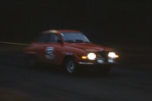 John Vanlandingham / Tom Gillespie at speed on the muddy roads of the Huron Mountains in their SAAB 96.
