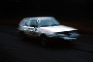 Wayne Prochaska / Annette Prochaska VW GTI at speed on SS1 in the Huron Mountains.