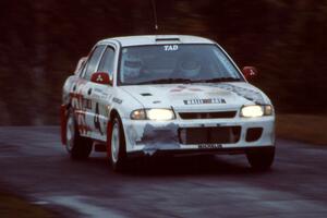 Henry Joy / Chris Griffin Mitsubishi Lancer Evo 2 take in easy at the jump on Brockway Mt.