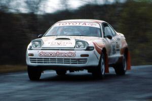 Bruce Newey / Charles Bradley in their Toyota Celica All-trac took an easy approach to the Brockway Mt. jump.