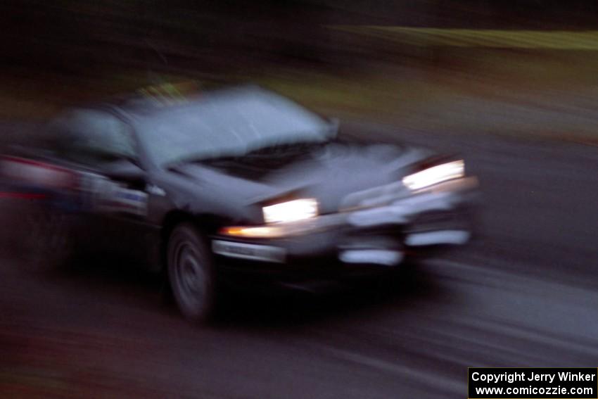 Cal Landau / Eric Marcus blast away from the start of SS1 in their Mitsubishi Eclipse.