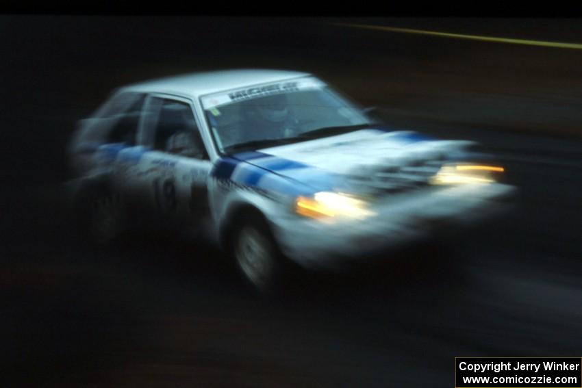 Mitch McCullough / John Elkin blast through the first few corners of SS1 in their Mazda 323GTX.