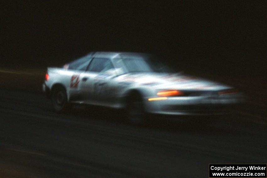 Janice Damitio / Amity Trowbridge slop on through the rain in their Toyota Celica All-trac.