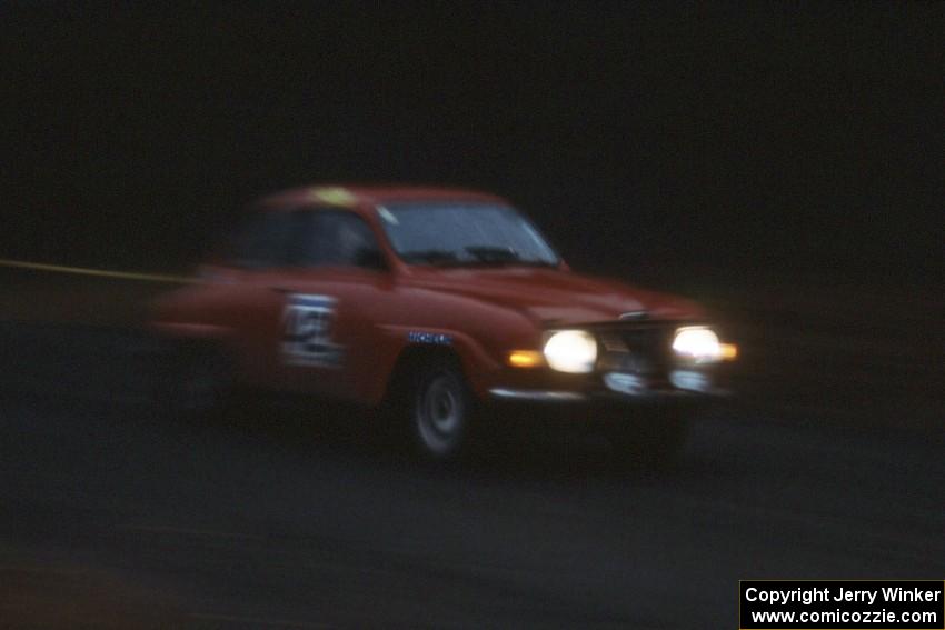 John Vanlandingham / Tom Gillespie at speed on the muddy roads of the Huron Mountains in their SAAB 96.