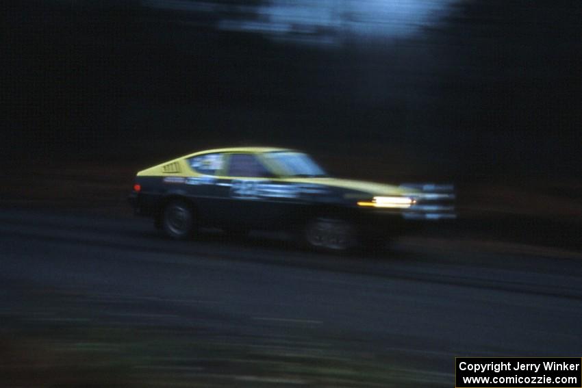 The Jeff Bothee / Tom Beltman Plymouth Arrow at speed on SS1 in the Huron Mountains.