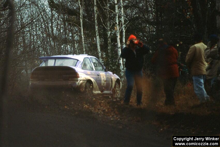 The Carl Merrill / John Bellefleur Ford Escort Coswort RS blasts through a corner on the Delaware Mine stage.