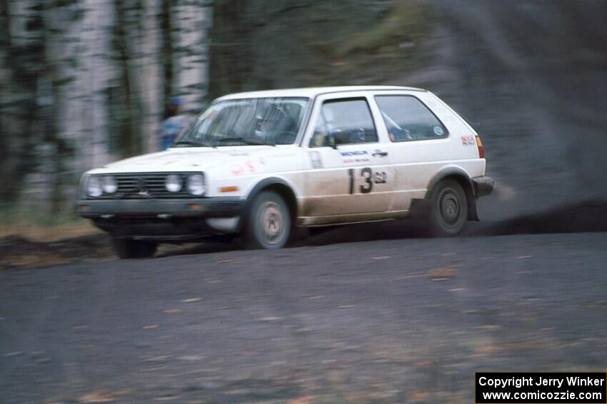 Wayne Prochaska / Annette Prochaska VW GTI at speed on the Delaware Mine stage.