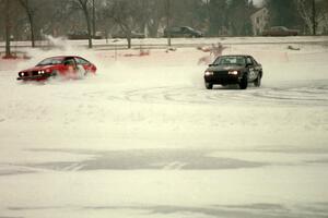 The Lyle Nienow / Mark Nienow Chevy Cavalier Z24 completes a pass on the Mark Knepper / Cary Kendall Alfa Romeo GTV6