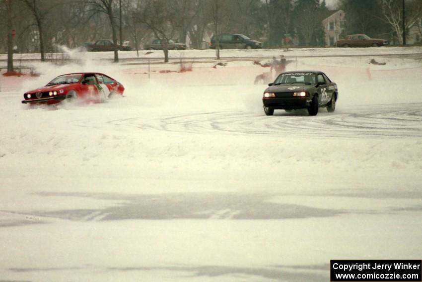 The Lyle Nienow / Mark Nienow Chevy Cavalier Z24 completes a pass on the Mark Knepper / Cary Kendall Alfa Romeo GTV6