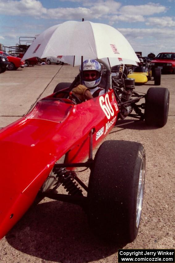 Mark Baker sits in his SR Titan Mk. 6 Formula Ford before the next run