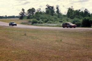 Mike Brown's SSC Suzuki Swift GTI followed by brother Dave Brown's SSC VW Golf