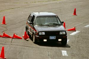 John Lyon's E Stock VW GTI clips a cone