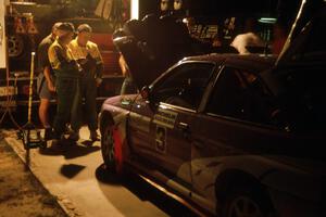 The Carl Merrill / John Bellefleur Ford Escort Cosworth gets serviced on the first night of the rally.