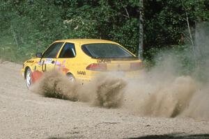 Sam Bryan / Rob Walden come out of a fast right at the crossroads in their SAAB 900 Turbo.