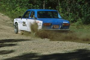 Pete Lahm / Jimmy Brandt slide their Datsun 510 through the uphill sweeper at the crossroads.