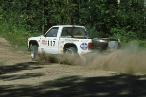 Ken Stewart / Doc Shrader go through the crossroads at speed in their Chevy S-10.