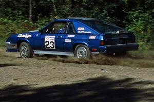 Mark Larson / Heather Cox at speed in their Dodge Shelby Charger at the crossroads.