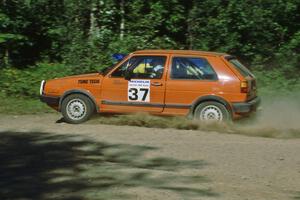 The Doug Davenport / Brent Cary VW GTI goes through the spectator corner at the crossroads.