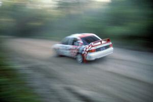 Henry Joy IV / Mike Fennell blast their Mitsubishi Lancer Evo II down Parkway Forest Road.