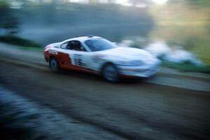 Ralph Kosmides / Joe Noyes at speed in their Toyota Supra down Parkway Forest Road.