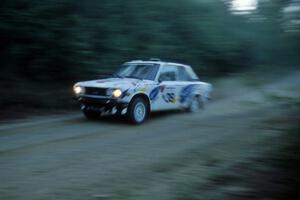 Mike Whitman / Paula Gibeault at speed in their Datsun 510 down Parkway Forest Road.