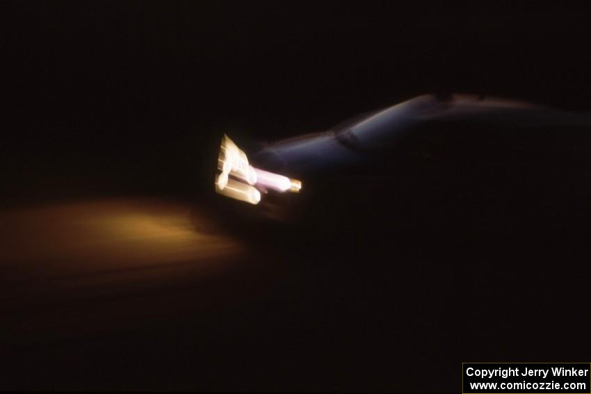 Carl Merrill / John Bellefleur Ford Escort Cosworth on an early evening stage on the first day.