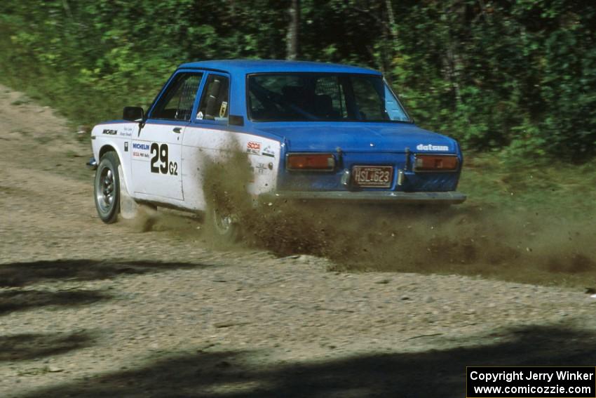 Pete Lahm / Jimmy Brandt slide their Datsun 510 through the uphill sweeper at the crossroads.
