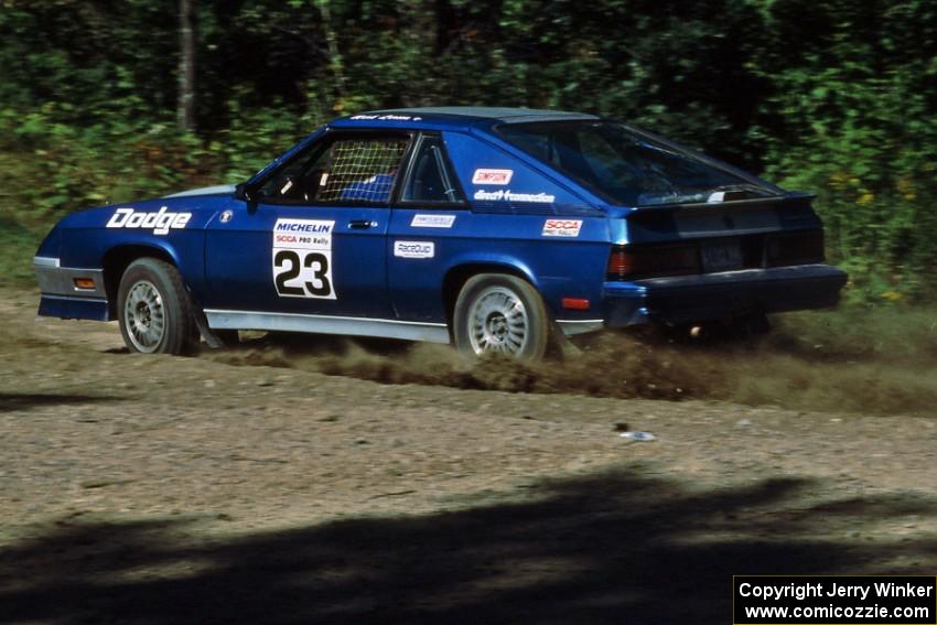 Mark Larson / Heather Cox at speed in their Dodge Shelby Charger at the crossroads.