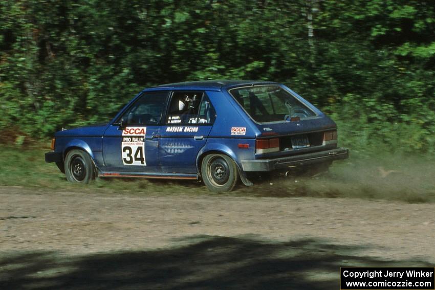 Mark Utecht / Paul Schwerin take a far inside line at the crossroads in their Dodge Omni GLH-Turbo.