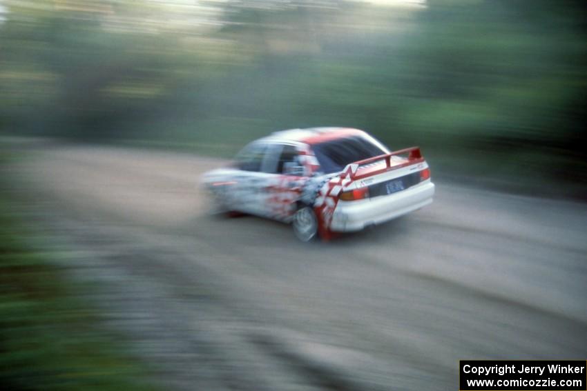 Henry Joy IV / Mike Fennell blast their Mitsubishi Lancer Evo II down Parkway Forest Road.