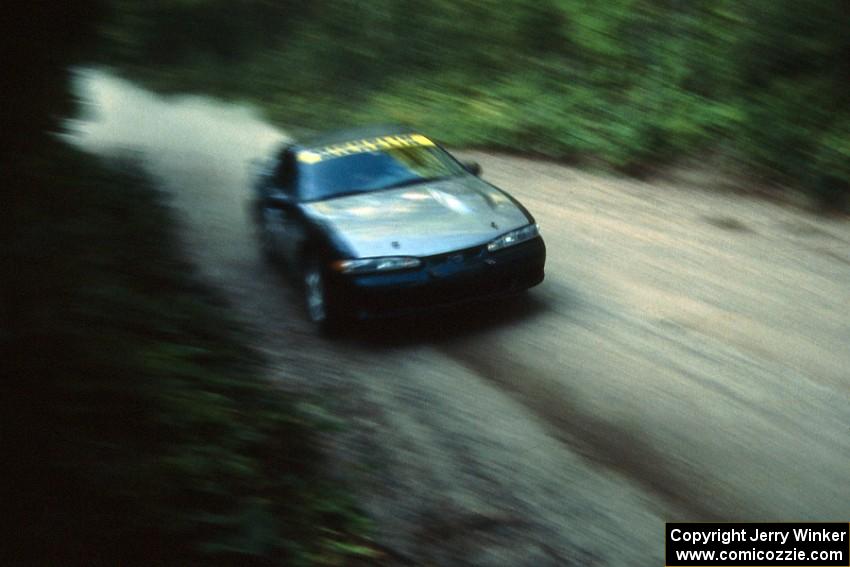 Selcuk Karamanoglu / Yorgi Bittner blast down Parkway Forest Road in their Eagle Talon.