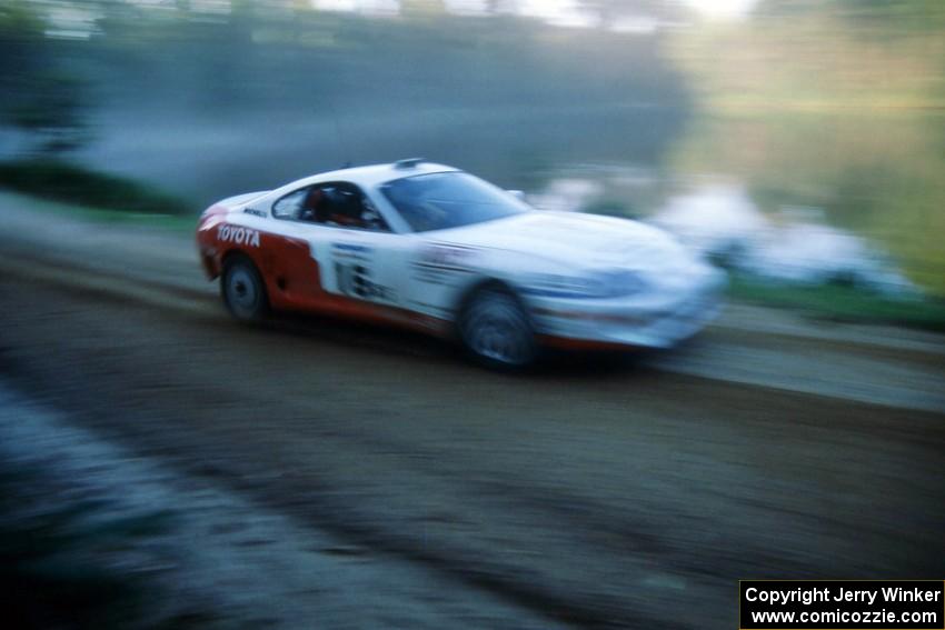 Ralph Kosmides / Joe Noyes at speed in their Toyota Supra down Parkway Forest Road.