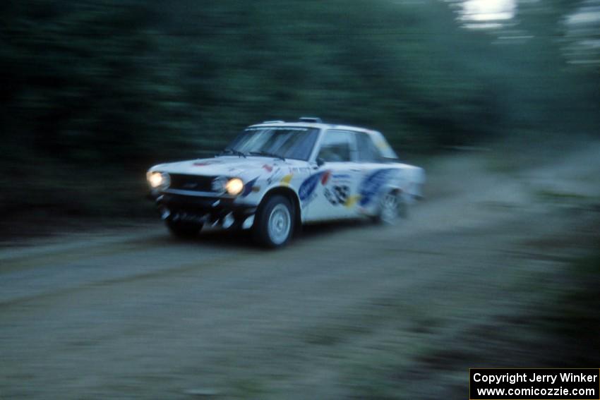 Mike Whitman / Paula Gibeault at speed in their Datsun 510 down Parkway Forest Road.