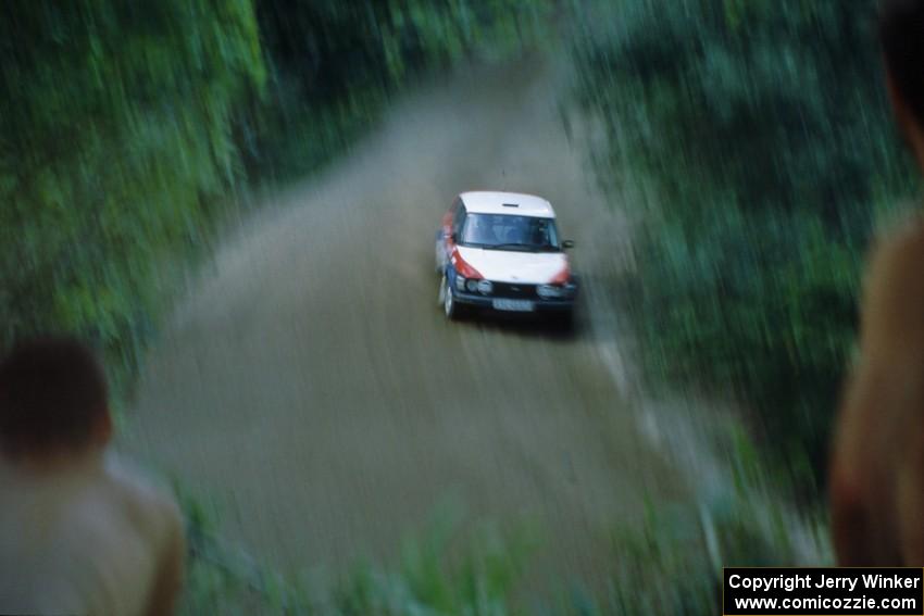 The George Plsek / Renn Phillips SAAB 99 is watched by Jake Himes (on the left) and Silas Himes (to the right).