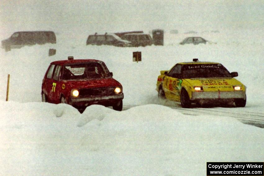 The Mark Knepper / Steve Carter Toyota MR-2 passes the Dee Pendergast / Jerry Melby VW Rabbit