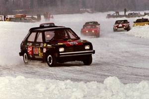 Doug Krause's Dodge Omni leads the field