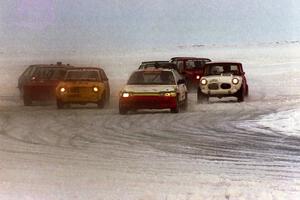 Non-studded race: The field comes out of turn one on the first lap. Paolo Gomez leads in his Honda CRX.