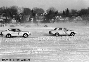 Tim Winker's Datsun 510  battles Paul Berg's Mazda RX-3.