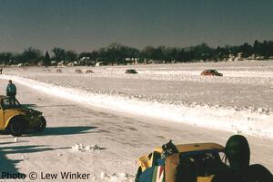 The field comes down the front straight on lap 1.