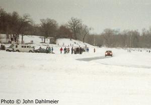 The view along the front straight into turn one. Car unknown.