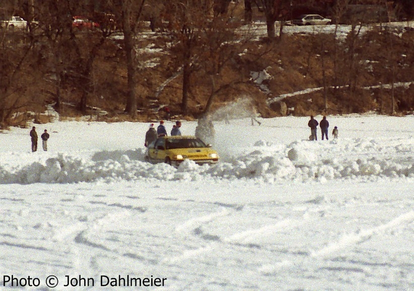 Peter Cunningham / John Hogdal Honda CRX hits a seeper on the backside of the course.