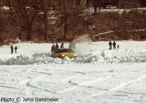 Peter Cunningham / John Hogdal Honda CRX hits a seeper on the backside of the course.