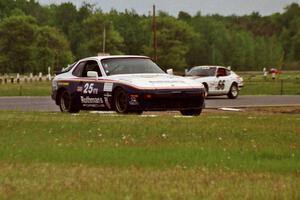 Joe Rothman's ITS Porsche 944 and Bill Tapper's ITS Datsun 240Z