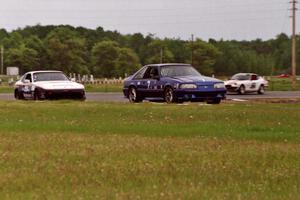 Damon Bosell's ITE Ford Mustang, Joe Rothman's ITS Porsche 944 and Bill Tapper's ITS Datsun 240Z