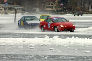 The Ford Escort ZX2s of Ted Mix / Mike Schmidt and Mike Rappa / Don Coatsworth ahead of the Dave Kapaun / Chris Wilke VW Rabbit